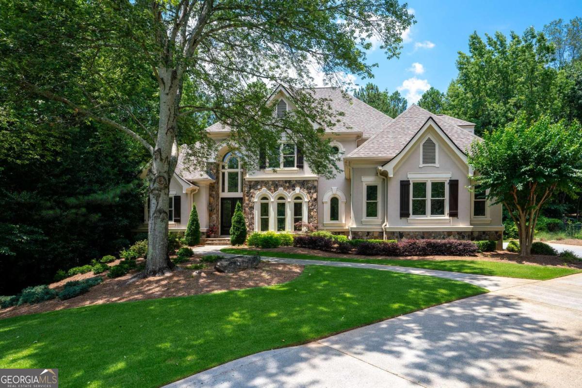 Great opportunity to get into Sugarloaf Country Club at one of the lower price points of the neighborhood. On a private cul-du-sac off of another cul-du-sac street, this home is in a highly desired area close to the front gate. The kitchen and primary bath were updated just a few years ago and all other secondary baths have been upgraded with brand new stone countertops. The primary bedroom on the main level has a newer screened porch that was recently added making it a truly serene retreat. The fresh paint throughout the home and new carpet on the upper level give you a clean slate! The unfinished terrace level has full daylight along the entire length of the home and is ready for your personal touch with enough space for 2 additional bedrooms, bathroom, living space, kitchen, gym space, and storage. As a single owner property, this home has been meticulously well kept and maintained. Walkable to the Greg Norman designed 27 hole TPC Sugarloaf golf course, Swim and Tennis center, restaurant, fitness center, and playground- resort style living at it's finest.