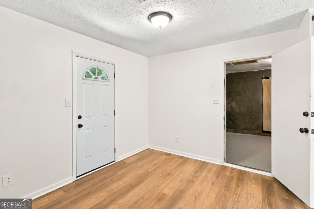Photo of 7260 Fernwood Drive, Riverdale, GA 30296 (MLS # 10869655)