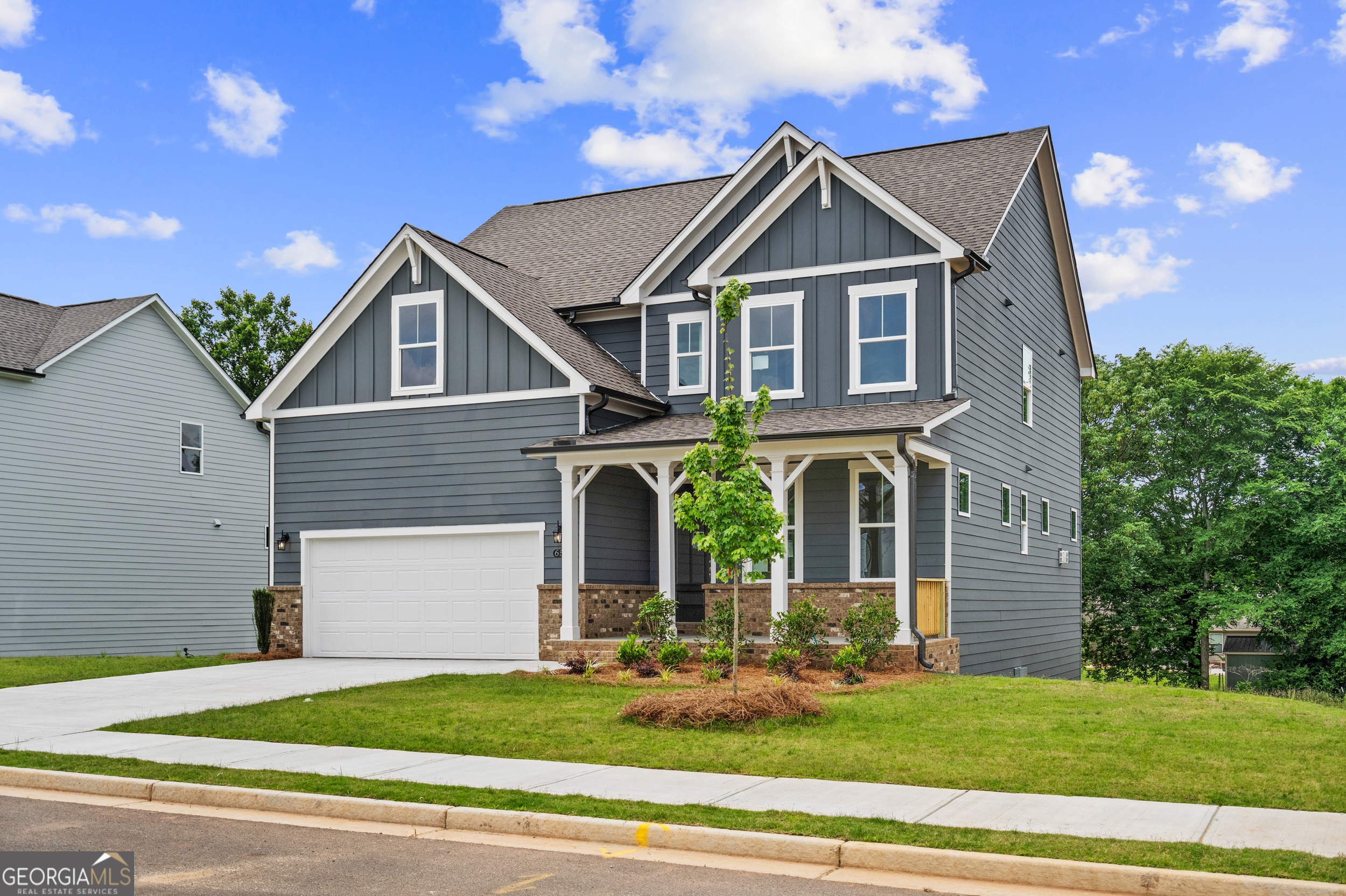 Discover Your Dream Home: HICKORY B - Lot 35 UNFINISHED DAYLIGHT BASEMENT MOVE-IN READY!! **CALL TODAY FOR EXCITING NEW DEALS** This stunning 4-bedroom, 3.5-bathroom home with an unfinished basement is designed to impress! The Hickory B welcomes you with an open floor plan that fills every space with natural light. The gourmet kitchen is a chef's delight, featuring 42" Summit Elegant White soft-close cabinets, Silestone Blanc Maple quartz countertops, and a spacious island-perfect for cooking and entertaining. The main level also includes a large office with French doors, offering the perfect work-from-home setup. Upstairs, you'll find four generously sized bedrooms, each with its own walk-in closet. The luxurious owner's suite is a private retreat, showcasing tray ceilings and a deluxe en suite bathroom. For added convenience, the second-floor laundry room is equipped with a sink and cabinetry. Located in a community offering unmatched value, this home boasts the lowest HOA fees in the area, the best price per square foot, and some of the largest homesites available. Plus, enjoy the flexibility of adding a third-car garage on nearly every homesite, providing extra space without sacrificing affordability. Don't miss this opportunity! Call today for exciting new deals and schedule a visit to see your future home. Model hours: Sunday - Wednesday |1 PM to 6 PM Monday - Saturday |10 AM to 6 PM. Photos may include upgrades and non-standard features for illustration purposes only. Actual home may vary based on designer selections and site plans.