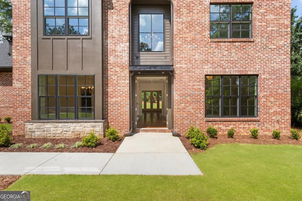 Photo of 3711 Mountain Cove Road, Snellville, GA 30039 (MLS # 10706036)