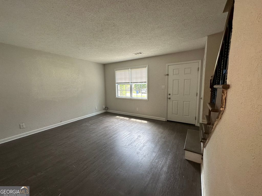 Photo of 12 Ezzard Street, Lawrenceville, GA 30046 (MLS # 10808347)