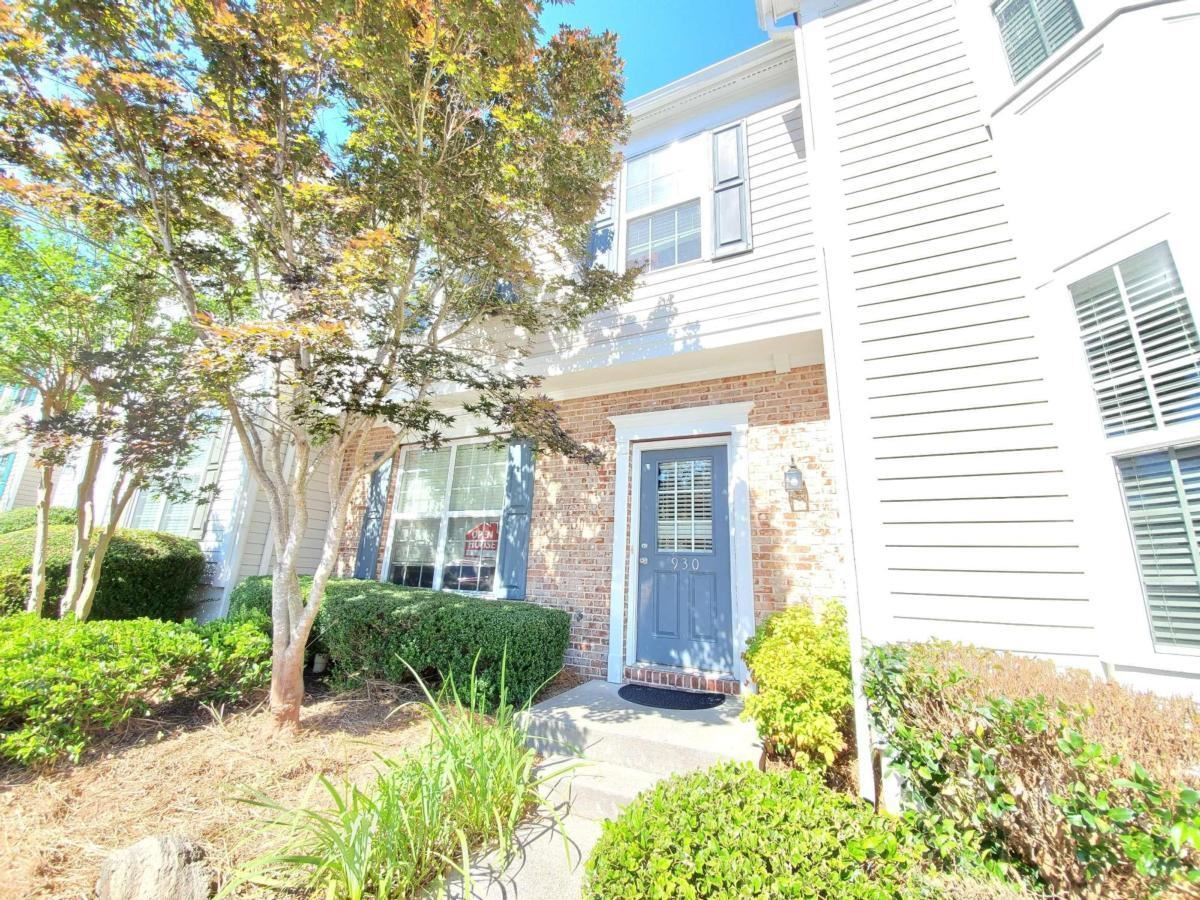 Tenants have moved out and home has been freshly painted. No rental restrictions. Cute 3 bed/ 2.5 bath townhome with prestigious Alpharetta address & lower Forsyth county taxes. This well kept home has all wood floors, 4 yrs old appliances (Cooking range, dishwasher, microwave, refrigerator), 1 year old water heater and newly installed gutter guards to help keep the gutters clean. Nice open floorplan with cozy fireplace in family room, overlooking the almost new kitchen & dining area. Large master suite upstairs with walk-in closet, double vanity, large tub & shower. Two additional secondary nice sized bedrooms which can be used as bedrooms, office, gym, playroom. Small storage area in the back which is attached to the townhome. Beautiful patio area to sip your morning tea or coffee. Neighborhood has pool & well maintained streets. Top rated schools. One of the best neighborhoods in Alpharetta. Best deal for the money. Close to shopping dining, hwy, Avalon, Halcyon.