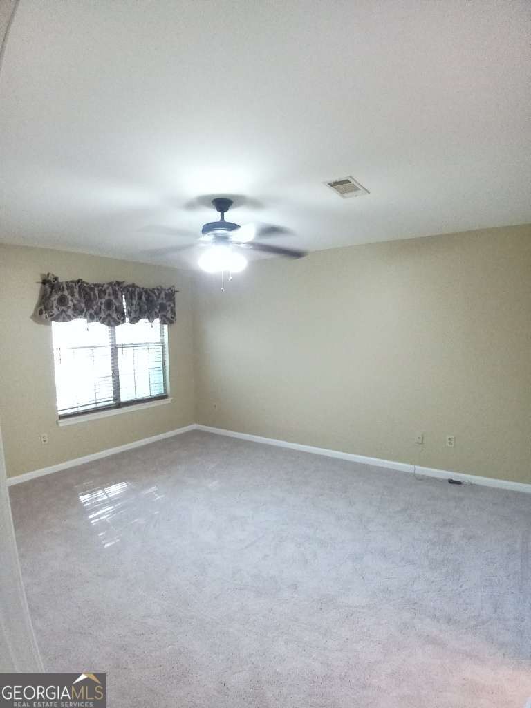 Cozy 2bed/2bath Duplex located in the Wesleyan Landing Subdivision. Featuring a private backyard with screened-in porch. Minutes from Hospital, schools and shopping.