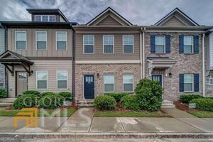 Includes Washer Dryer and Fridge! Hop Skip & Jump to Downtown Atlanta Gated Townhome 2 Bedroom + Loft Open Floor plan, Gourmet Kitchen with Stainless Steel Appliances, Granite Countertop, 42 Inc Cabinets, Island with Breakfast Bar, Oversize Walk in Pantry, Open Views to Dining and Living Room, Sliding Glass Doors to Views of Fenced in Back Yard, New Sod, Upstairs has Oversize Primary Bedroom with Walk in Closet and Primary Bath with Double Sinks & Granite, Tile Floors and Walk in Shower, Roommate Floorplan, Nice Size Loft in the Middle of the Upstairs Bedrooms, Secondary Bedroom Good Size with Large Walk in Closet and Ensuite Bathroom Tile Floors with Tub/Shower, Large Fenced Backyard with New Sod & Covered Patio, Community has a Pool, Picnic Pavilion, Play Park & Clubhouse, Great Location West Side of Atlanta Close to I-20 and I-285 Lots of Shopping and Restaurants. Dont Miss This One.
