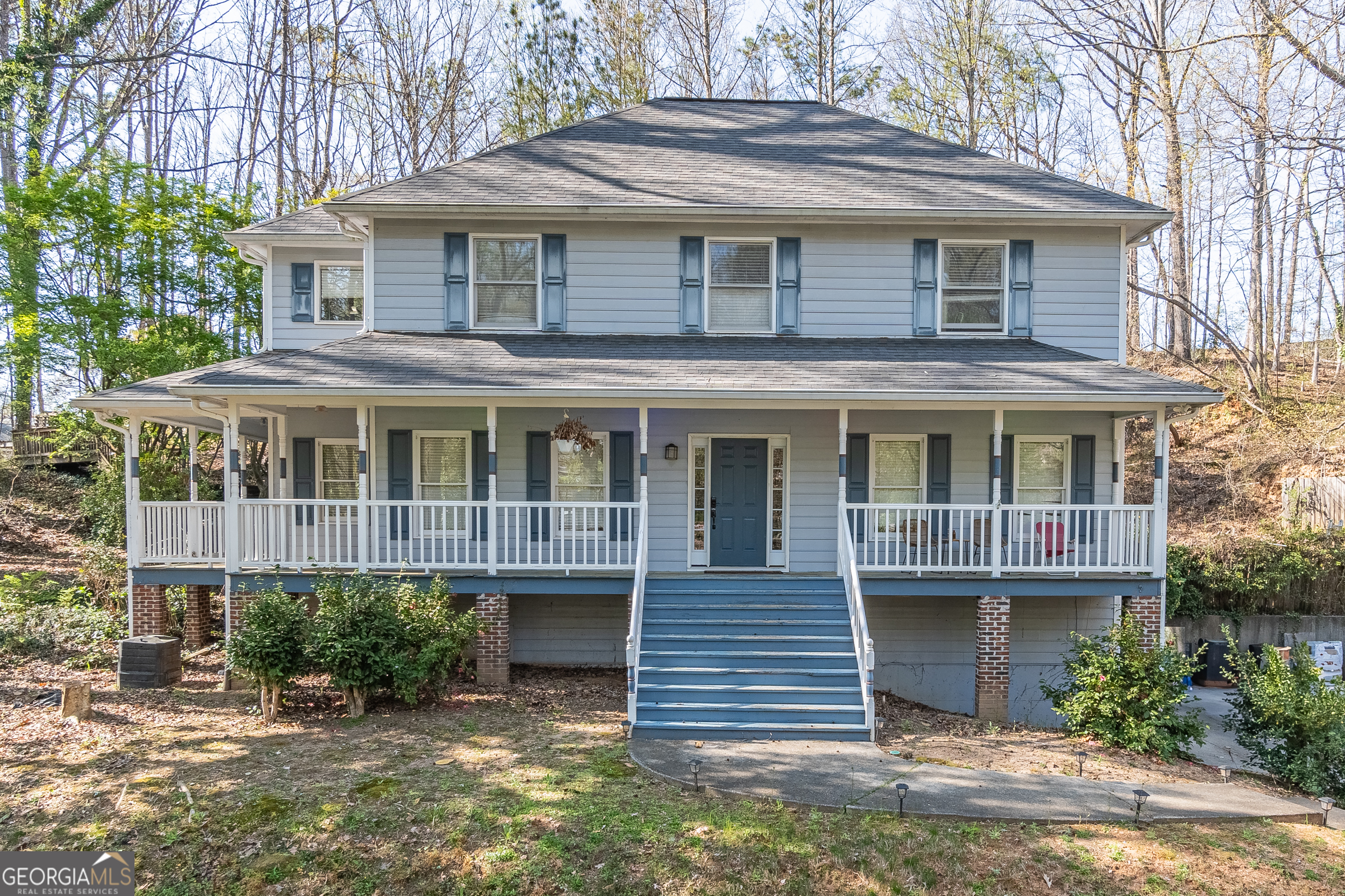 Charming and Meticulously Maintained Home with Wraparound Front Porch! This beautiful home is full of warmth and character. The main level boasts gleaming hardwood floors and a classic layout, featuring a formal dining room and a cozy family room with a fireplace. The kitchen is well-appointed with granite countertops and stainless steel appliances, and just off the kitchen, you'll find a convenient mudroom with a laundry area and access to the porch.Upstairs, all four bedrooms provide comfortable living space, including a spacious primary suite with an updated en-suite bathroom. The additional bedrooms are generously sized, perfect for family or guests. The fully finished basement offers an abundance of extra space, complete with a half bath-ideal for a rec room, home office, or gym. Step outside to enjoy the deck, patio, and an adorable shed, all set on a partially wooded lot that offers both privacy and plenty of level space for entertaining and play. This home has a new septic system installed with warranty. Please bring all your offers, the seller is motivated!!! Don't miss this incredible opportunity, schedule your tour today! Please provide offers via a single PDF; DocuSign, or Dotloop invites.
