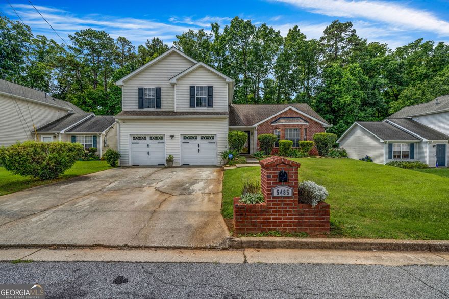 Step into a home that's been loved, upgraded, and thoughtfully cared for. Welcome to 5485 Shirewick Lane! This move-in ready 3 bed, 2.5 bath split-level blends comfort and space with smart updates that make life easier. From the fresh interior paint and new carpet (2020-2021) to the brand-new HVAC system installed in 2024, this home gives you peace of mind from day one. The kitchen with natural gas range and SS appliances was refreshed in 2021 and opens to two spacious living areas, one with a fireplace, plus a formal dining room--perfect for entertaining or everyday living. Upstairs, the oversized primary suite with gorgeous blue accent wall features dual walk-in closets, soaking tub and separate shower, and separate vanities while the secondary bedrooms are light, bright, and well-sized. Bonus: Washer, dryer, and refrigerator all stay, making your move even simpler. Outside, enjoy a patio and private backyard backing up to woods--no rear neighbors here!  Located near Stonecrest Mall, dining, parks, and major commuter routes, this home offers convenience without the HOA restrictions.