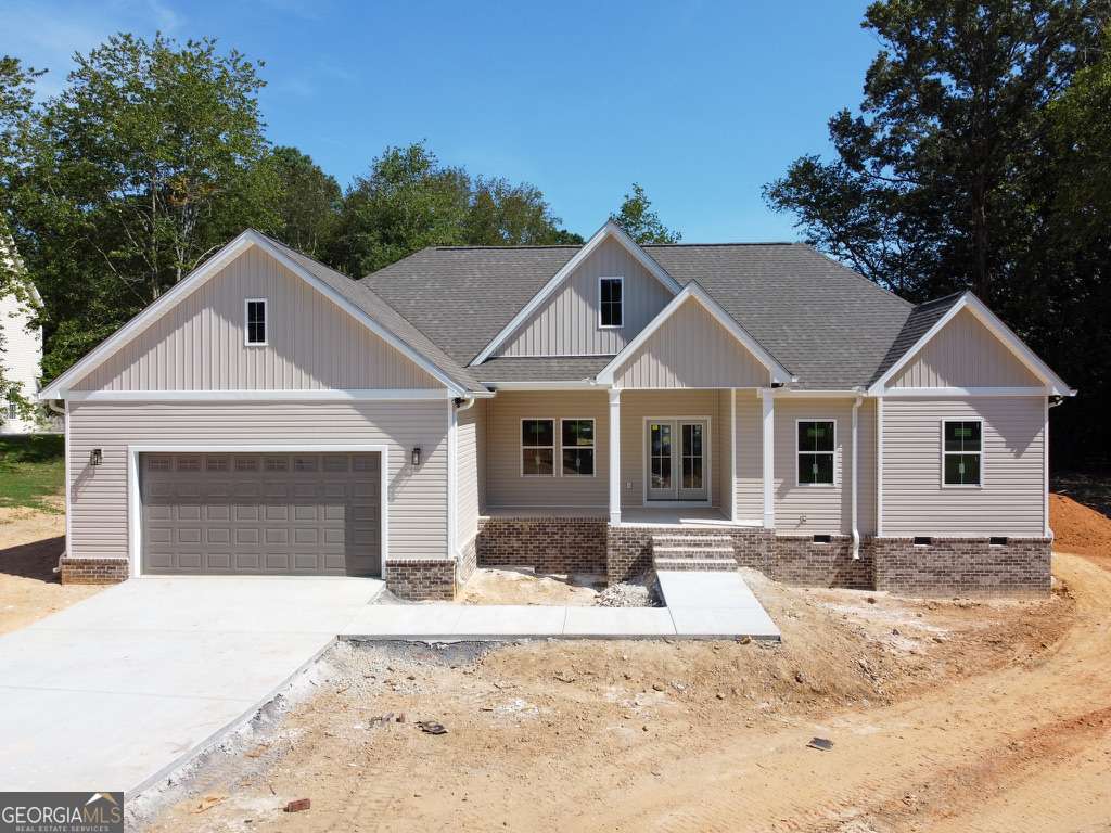 4-bedroom new construction located in a quiet cul-de-sac within an established neighborhood. Features include quartz and granite countertops throughout, luxury vinyl plank flooring, and a walk-in pantry. The master suite offers a separate tile shower and direct access to the laundry room through the walk-in closet. Enjoy a brick fireplace and a large covered patio. Estimated completion by the end of August.