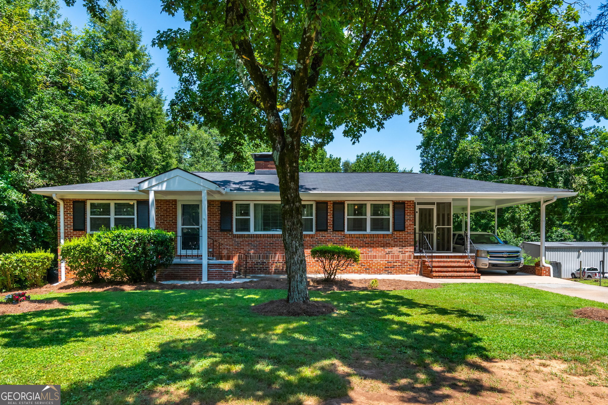 Fantastic opportunity on Main St in historic downtown Acworth. Built in 1957, the home has been beautifully renovated. Its history spans 8 decades, nearly 80 years of one family's stories. They say it's time for the next chapter to be written. Situated on .7 acres, this property is zoned R4. You can keep the home as a single family residence or build a multi-family complex. If you'd like to move your business here, the property is strategically located at the corner of Main St. and New McEver Road. The property should be easily rezoned as commercial as surrounding properties are zoned commercial. Perfect for an insurance agency, physician/dental office, shop, breakfast restaurant, coffee shop, hair salon, host classes for art and or special projects, possibilities are endless. Call our team for an early look, the property won't last long on the open market. The owners do live here, please call for an appointment to show.