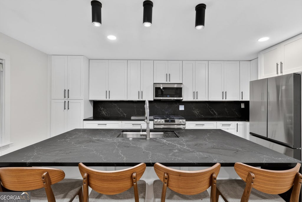 Photo of 1445 Monroe Drive NE #F2, Atlanta, GA 30324 (MLS # 10816166)