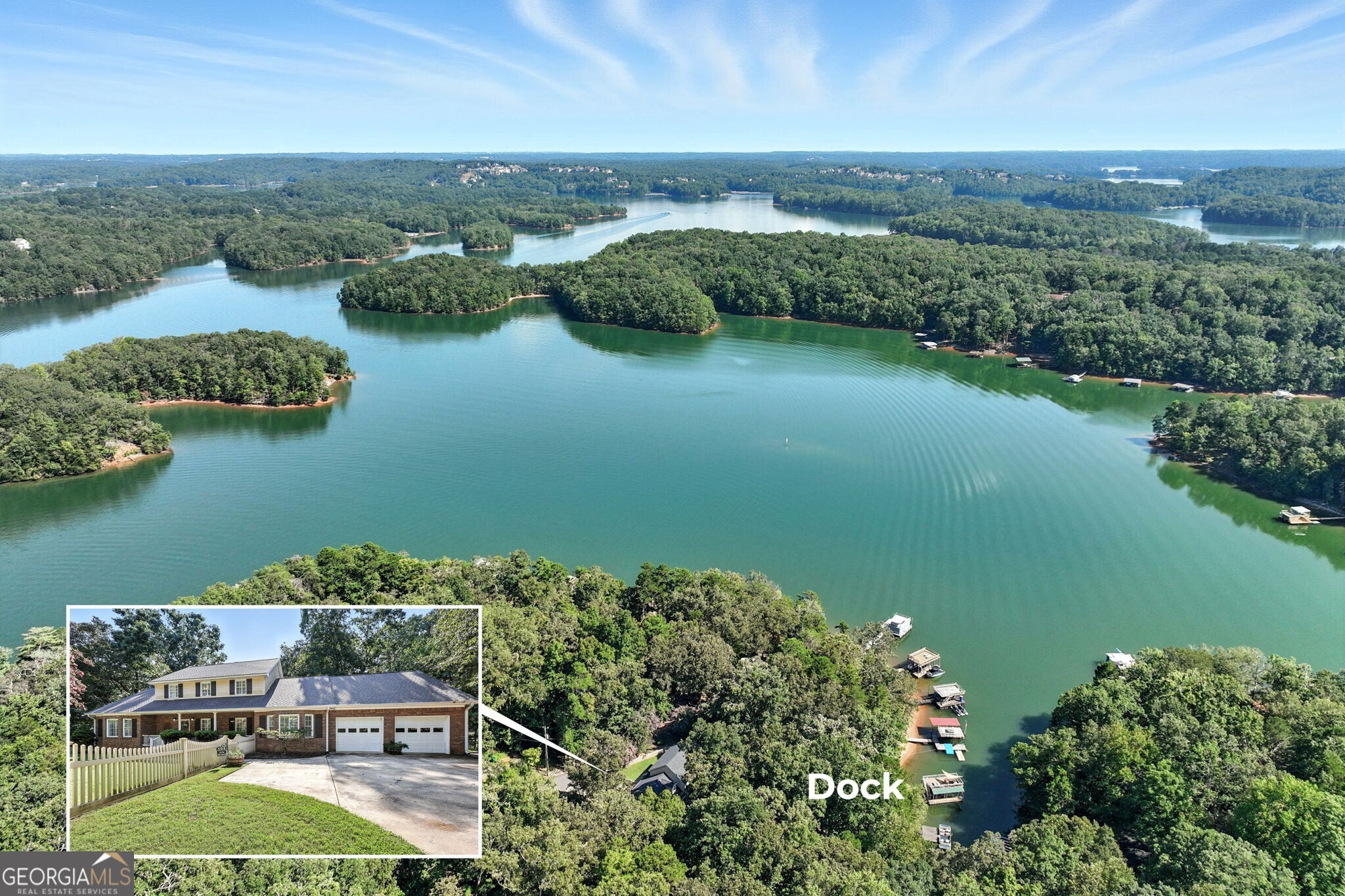 This rare Lake Lanier find offers 4 bedrooms, 4 full baths and 2 oversized bonus rooms making it the perfect retreat for entertaining, relaxing, and enjoying the lake lifestyle. To top it off, the home is being sold completely furnished! From the level driveway and inviting front porch, you'll step into a thoughtfully designed home with a graceful flow from the foyer and staircase into the family room, currently enjoyed as a recreation space, and then on to the great room with a cozy fireplace. A wall of windows frames sparkling lake views and draws you into the large, open kitchen with stainless steel appliances, granite countertops, and a bright breakfast area, while the separate dining room provides plenty of space for gathering with family and friends. The main level also includes a spacious suite with an oversized full, along with a convenient half bath and another full bath just off the kitchen for easy access after a day on the water. A large laundry room with sinks makes it simple to handle wet towels and lake gear. Upstairs, five generously sized bedrooms and a full bath provide comfortable accommodations for all your guests. The outdoor living is just as inviting, with an expansive screened-in porch overlooking the water, a side deck with connections for a hot tub in place and a separate grilling deck with ample space for outdoor seating. From there, it's just an easy walk to your private single slip dock with party deck and electricity, where you'll enjoy year-round deep water and wide, open views of the lake. Practical touches add even more appeal, including plenty parking space, two fenced-in yard areas, and a storage shed for all of your lake toys. Nestled on a quiet street, the property is just minutes from War Hill Park boat ramp, Athens Boat Club for gas and fireworks, quick access to Ga 400, Dawsonville shopping, restaurants, hiking, Dahlonega, and North Georgia's favorite wineries. With its blend of comfort, convenience, and its proven success as a short-term rental, this is a rare opportunity on Lake Lanier that you won't want to miss!