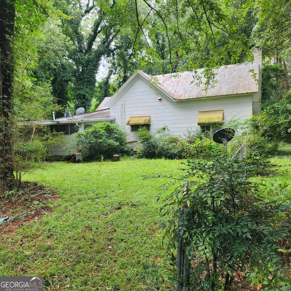 Photo of 5300 Flakes Mill Road, Ellenwood, GA 30294 (MLS # 10831145)