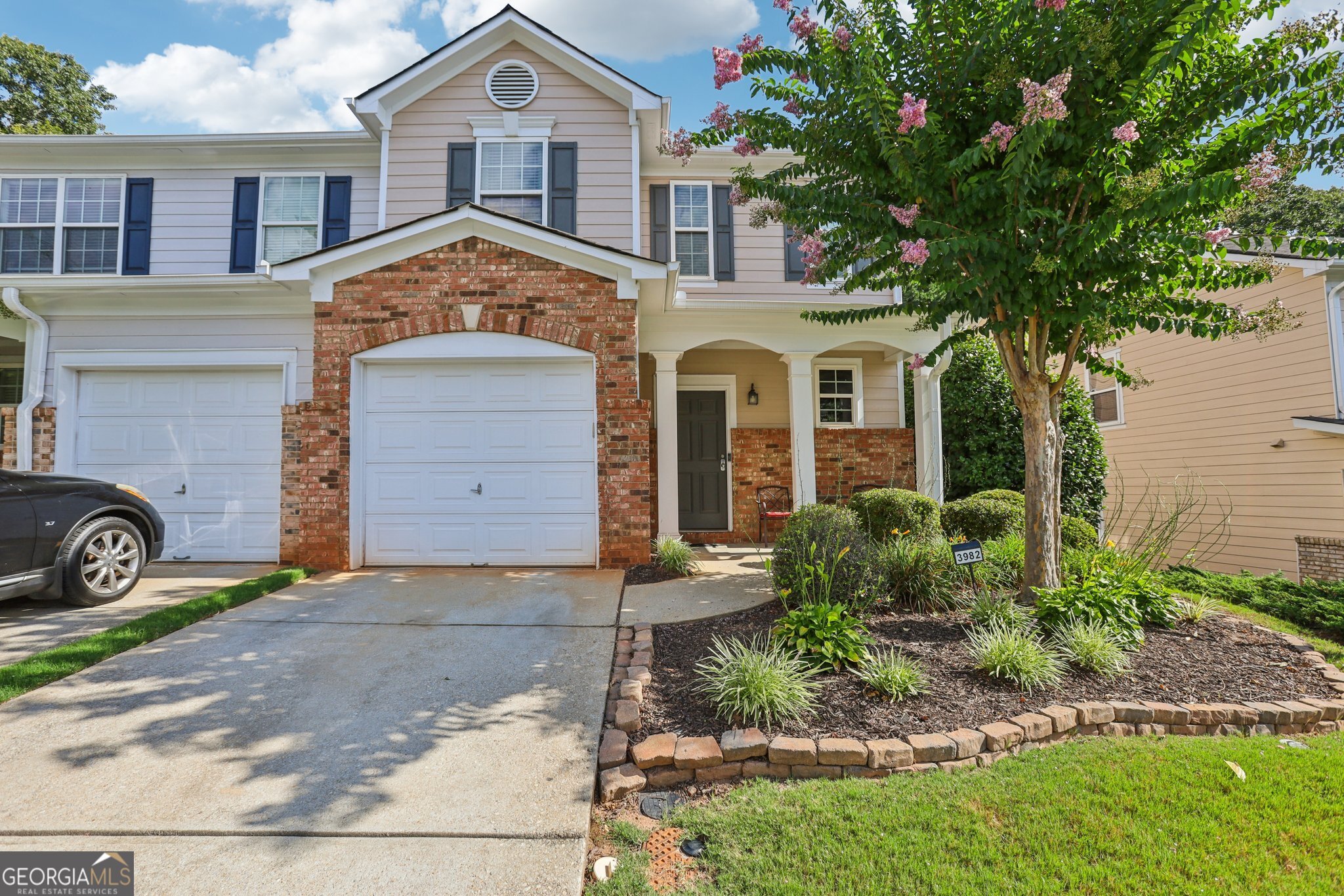 Welcome to 3982 Carlinswood Way - a beautifully maintained end-unit townhome nestled in a quiet community in the heart of Stone Mountain. This spacious 3-bedroom, 2.5-bathroom home offers an ideal blend of comfort, functionality, and modern style. Step inside to discover a light-filled open-concept living area that seamlessly connects to the kitchen, featuring a large island with breakfast bar, perfect for casual dining or entertaining. The main floor's layout is ideal for both relaxed living and hosting guests. Upstairs, you'll find a versatile loft space, perfect for a home office, media room, or play area. The spacious primary suite is a true retreat with a generous walk-in closet and an ensuite bath complete with a soaking tub. Enjoy the outdoors in your backyard and patio, ideal for morning coffee or evening relaxation. As an end unit, this home offers added privacy and extra natural light throughout. Conveniently located near shopping, dining, parks, and major highways, this townhome is a must-see! Don't miss your chance to own this move-in ready gem - schedule your showing today!