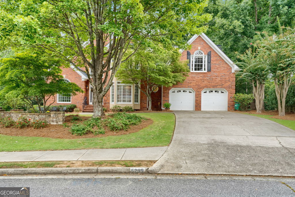 Photo of 5299 Garnaby Lane NW, Peachtree Corners, GA 30092 (MLS # 10853845)