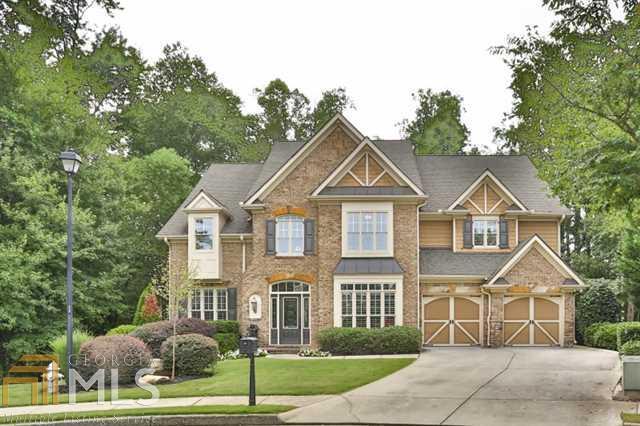 Fabulous 5 bedroom 4 full bath 2 story home with AMAZING private & fenced backyard on quiet cul-de-sac! Gorgeous hardwood floors, iron spindles, chef's kitchen w/glazed cabinetry, granite, tile backsplash, double ovens, HUGE island & more. Guest bedroom with full bath on main! 2 story great room w/stone fireplace & wall of windows overlooking backyard & deck, huge dining room, office also on main. Luxurious master suite up w/spa like bath. 3 more spacious bedrooms, one w/private bath & two that share Jack-n-Jill. Great Amenities. New Roof! Fantastic schools. Wow!