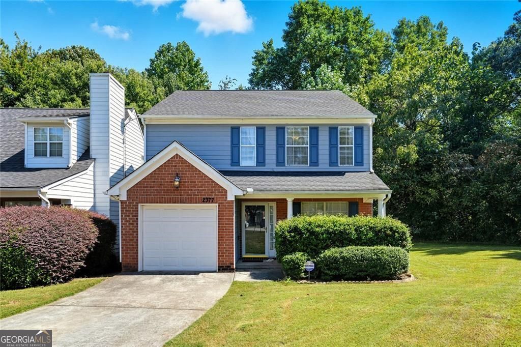 Welcome to 2377 Charleston Pointe! This three-bedroom, three-bath home has been impeccably maintained and thoughtfully updated, showcasing modern finishes and stylish details throughout. With a newer roof, newer kitchen appliances, and fresh LVP and carpet flooring, every detail has been designed for comfort and peace of mind. Step inside to a bright, open floor plan accented by fresh paint and updated fixtures. The spacious kitchen features extended white cabinetry, butcher block counters, and a seamless flow into the living and dining areas-perfect for both everyday living and entertaining. Smart-home upgrades, including a Nest Gen 5 thermostat, Ring doorbell, and security system, add convenience and efficiency. The primary suite is a true retreat with a new double vanity, while the secondary bedrooms and bathrooms have also been refreshed with new vanities and finishes. Outside, the home's prime cul-de-sac location provides a long driveway with ample parking and a one-car garage. With HOA coverage that includes yard maintenance and trash service, this home offers low-maintenance living at its best. Move-in ready and turn-key, 2377 Charleston Pointe blends style, function, and ease-all just minutes from downtown Atlanta conveniences.