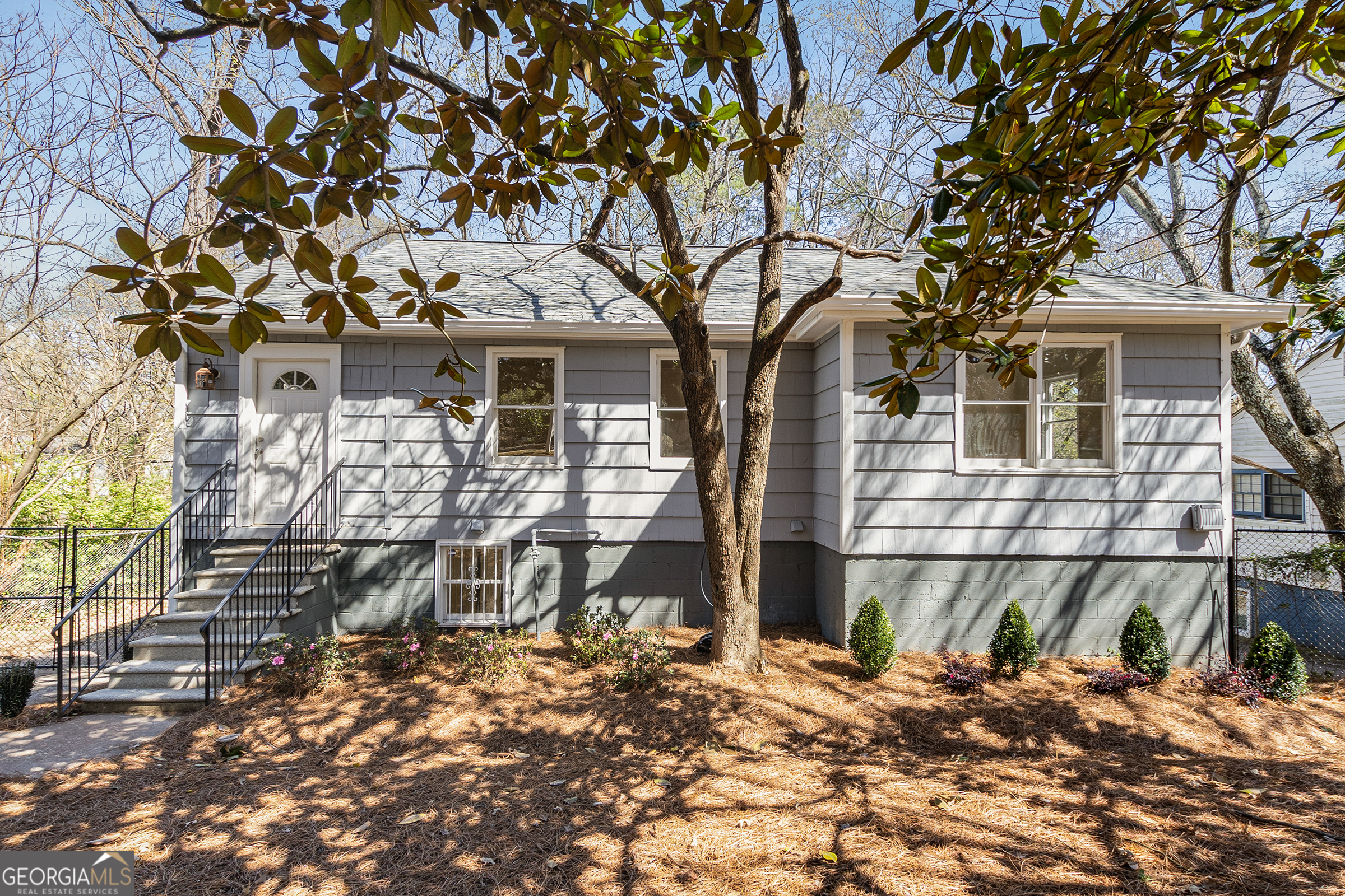 NEW BUYER INCENTIVE-SELLER WILL PAY UP TO $15,000 IN BUYER CLOSING COSTS THAT CAN ALSO BE USED FOR AN INTEREST RATE BUY DOWN!. 2126 Jernigan has has been newly renovated with new kitchen finishes + stainless appliances; marble and tiled baths with all new fixtures + lighted medicine cabinet + frameless shower surround; newly refinished hickory floors on the main + new LVT downstairs and so much more. This home is charming and comfy. Enter into a bright and cheery sunroom and drink in the lovely light and elegant finish on the new flooring. The kitchen and dining area is open to the living room for the contemporary buyer who appreciates a semi-open concept. Two graciously-sized bedrooms upstairs are served by a beautiful marble clad bath. Downstairs you'll find a large sitting area, two more generous bedrooms, a laundry room and another perfectly appointed bath. Add to that a new parking pad in the rear of the house, new landscaping and a fully fenced rear yard for Fido and you have it all. Walk your primary school student to school, play 18 holes of golf at beautiful Brown's Mill Golf course just a few blocks away. The PATH Foundation Southtowne Trail starts at the golf course and heads north offering a beautiful place for urban hiking. Plans for a connection to the Atlanta Beltline Southside Trail are in place! Grab a 7 mile Uber ride over to Hartsfield Jackson for a get-away if that's your Vibe. This area is HOT! Get in before prices skyrocket. The lower level is a EASY conversion to an short-term rental unit for an owner-occupant living on the main level. Repeat...7 miles to Hartsfield Jackson. Let someone else pay your mortgage! ASK ABOUT 100% FINANCING AVAILABLE Call today.
