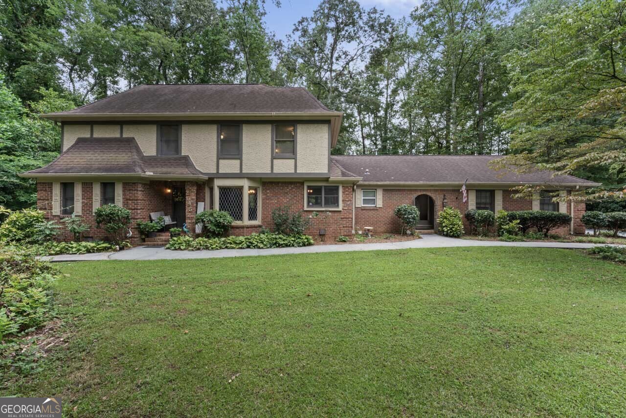 Location, Location, Location! Cozy 4 bedroom 3.5 bath home located in the coveted North Shores of Lake Spivey. The lower level features a large kitchen with breakfast nook, formal dining room, 2 story living room, office, library and half bath. The master bedroom is on the main level with ensuite bathroom. The upper level overlooks the living room and features three secondary bedrooms and two full baths. Large two car garage with storage room. Step out into the back yard which has an area for grilling and relaxing or move on toward your own personal dock! Don't let this one pass you by, make an appointment now to view.