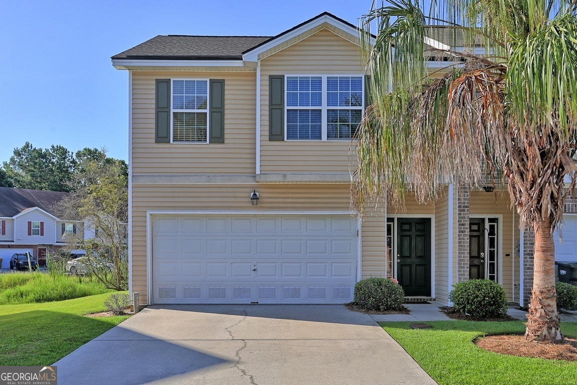 HIGHLY MOTIVATED SELLERS & PRICED TO SELL! This well maintained 2bd/2ba End Unit Townhome is in the gated community of Orchid Isles East. This home features a NEW ROOF, high ceilings, hardwood floors in common areas, an open-air floor plan, 2 car garage, & underground utilities. Kitchen appliances are included, as well as the like new washer & dryer. Enjoy evenings barbequing on the rear deck or have a refreshing swim in the pool! This home is very convenient to Savannah and neighboring areas. Being just 4 miles to Savannah, 5 miles to I-95, 9 miles to Richmond Hill,14 miles to Pooler, and 25 miles to the new Hyundai Plant; trips to work should be a breeze. Call today to schedule your personal tour of this wonderful home!
