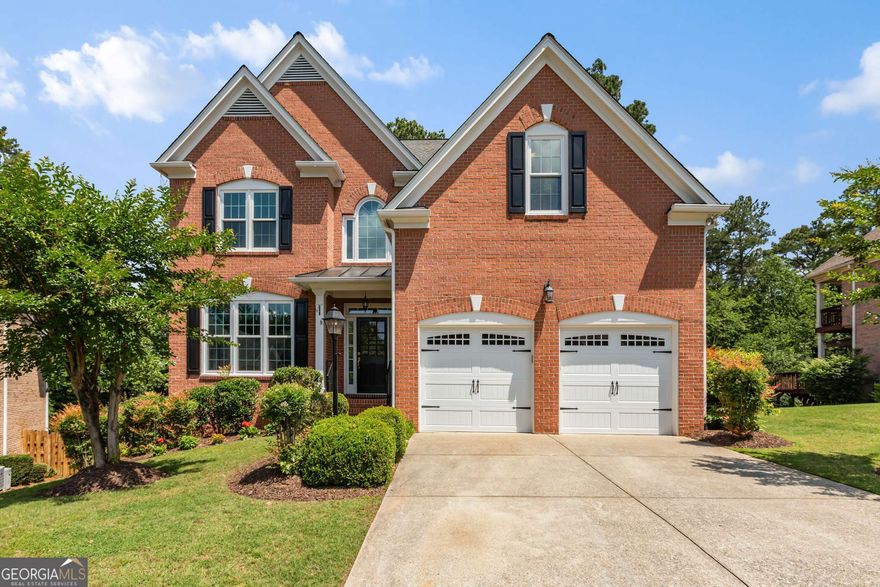 Welcome to 210 Wentworth Terrace, where every corner of this home is made for making memories. Tucked at the end of a quiet cul-de-sac in Johns Creek, this all-brick beauty offers the perfect mix of fun, function, and classic charm. Mornings begin with sunlight pouring into the vaulted living room as you grab breakfast in the cozy kitchen nook before heading off to work or to school in one of the area's top-rated districts. After a busy day, everyone gathers in the heart of the home-whether that's cooking together in the spacious kitchen, relaxing in the sunroom with board games, or cozying up by the fireplace. The main-level primary suite gives you your own quiet space, while upstairs bedrooms are perfect for kids or guests, office space - you name it! The custom shelving in the huge closets makes storage out of sight, out of mind. The hardwood floors have just been refinished and are spectacular! Downstairs, the finished basement becomes the ultimate hangout spot. There's room for movie nights, pool tournaments, a custom bar area that is excellent for maximizing entertaining with your friends and there is even a built-in wooden sauna with steam-yes, it's for serious relaxing - you'll love it before or after a dip in the hot tub! On weekends, step outside to a backyard built for play and relaxation, from the hot tub on the terrace level to grilling and dining al fresco on the expansive multi-level decks. Sundowner's cocktail hour is the best here! Host birthday parties, BBQs, enjoy backyard games, or just soak in the peace and privacy of your new tree lined private and fenced back yard. You're minutes from shopping & restaurants & fun at Avalon, Wills Park, Rock Mill Park, Downtown Alpharetta & Johns Creek attractions like the Ameris Amphitheatre, Top Golf, Country Club of Roswell and so much more! With easy access to GA-400, getting to work or weekend adventures is a breeze. This home is more than a place to live-it's where your next chapter begins!
