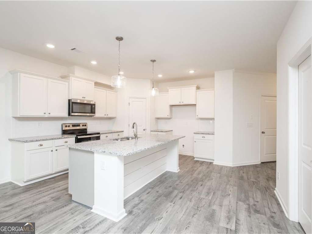 Photo of 4899 Mountain Rose Walk, Buford, GA 30518 (MLS # 10728794)