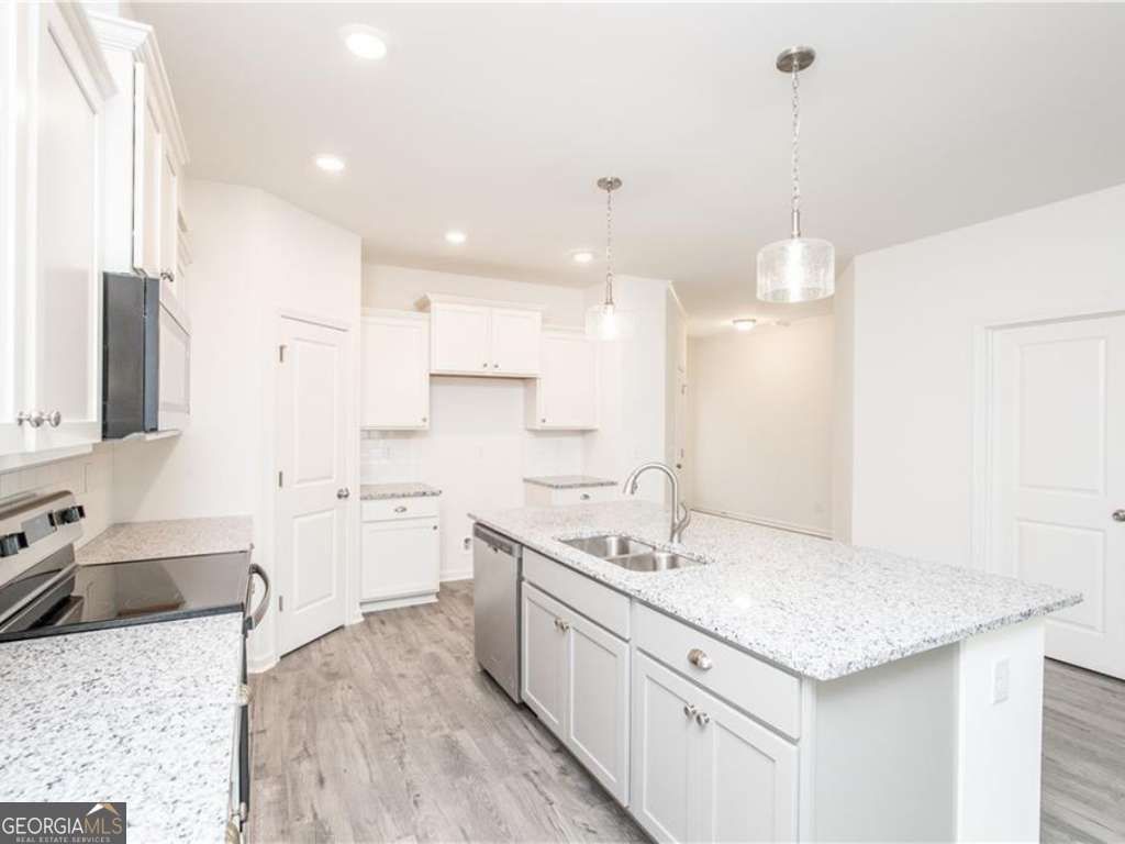 Photo of 4899 Mountain Rose Walk, Buford, GA 30518 (MLS # 10728794)