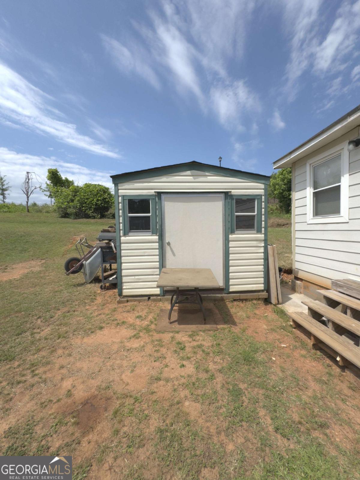 Located at 380 South Street, Buford, GA 30518, this 3-bedroom, 2-bathroom home sits in the heart of historic downtown Buford - just steps away from shops, restaurants, and schools. NO HOA! This property offers a unique chance for investors to complete a renovation project and add value in a high-demand area. The home is being sold as-is, with partial remodeling already started. Ideal for cash buyers only. Don't miss this chance to own in one of Gwinnett County's most sought-after locations. Bring your vision and turn this into a profitable flip or rental!