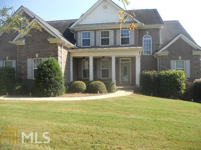 What a deal! 2BR/2BA on the main (master is on the main) and 2BR/1BA up, all brick on a full unfinished basement, large kitchen, separate dining room, living room with a fire place, bonus room, attached two car garage. Union Grove School district. Sold "AS IS" with no disclosures, warranties or repairs.