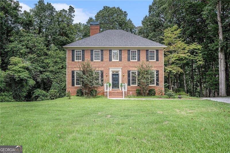 THIS EXCEPTIONAL HOME OFFERS AMPLE LIVING SPACE FOR A LARGE FAMILY. THE LIVING ROOM FEATURES A COZY FIREPLACE, AND THERE'S A SPACIOUS DINING ROOM PERFECT FOR THE UPCOMING HOLIDAYS. ENJOY THE CONVENIENCE OF THE KITCHEN, WHICH PROVIDES A VIEW OF THE BREAKFAST ROOM AND A HUGE FAMILY ROOM. THERE IS A GUEST BEDROOM ON THE MAIN LEVEL WITH A FULL BATHROOM, AS WELL AS A POWDER ROOM FOR GUESTS. ON THE SECOND LEVEL, YOU'LL FIND THREE ADDITIONAL BEDROOMS. THE LARGE MASTER BEDROOM INCLUDES A LUXURIOUS BATHROOM SUITE AND A COMFORTABLE WALK-IN CLOSET. THE TWO ADDITIONAL BEDROOMS HAVE THE POTENTIAL TO ACCOMMODATE QUEEN-SIZE BEDROOM SUITES. STEP OUTSIDE TO ENJOY THE COVERED WRAP-AROUND DECK, IDEAL FOR ENTERTAINING. THE BASEMENT OFFERS A FAMILY ROOM COMPLETE WITH BUILT-IN BOOKSHELVES AND A WET BAR, ALONG WITH AN ENTERTAINMENT ROOM, BEDROOM, AND A FULL BATH. LET THE FESTIVITIES CONTINUE ON THE LARGE PATIO OVERLOOKING THE PRIVATE BACKYARD. THIS HOME IS CONVENIENTLY LOCATED WITHIN 5-10 MINUTES OF RESTAURANTS, PUBLIX GROCERY STORE, LA FITNESS, I-20, AND MUCH MORE.