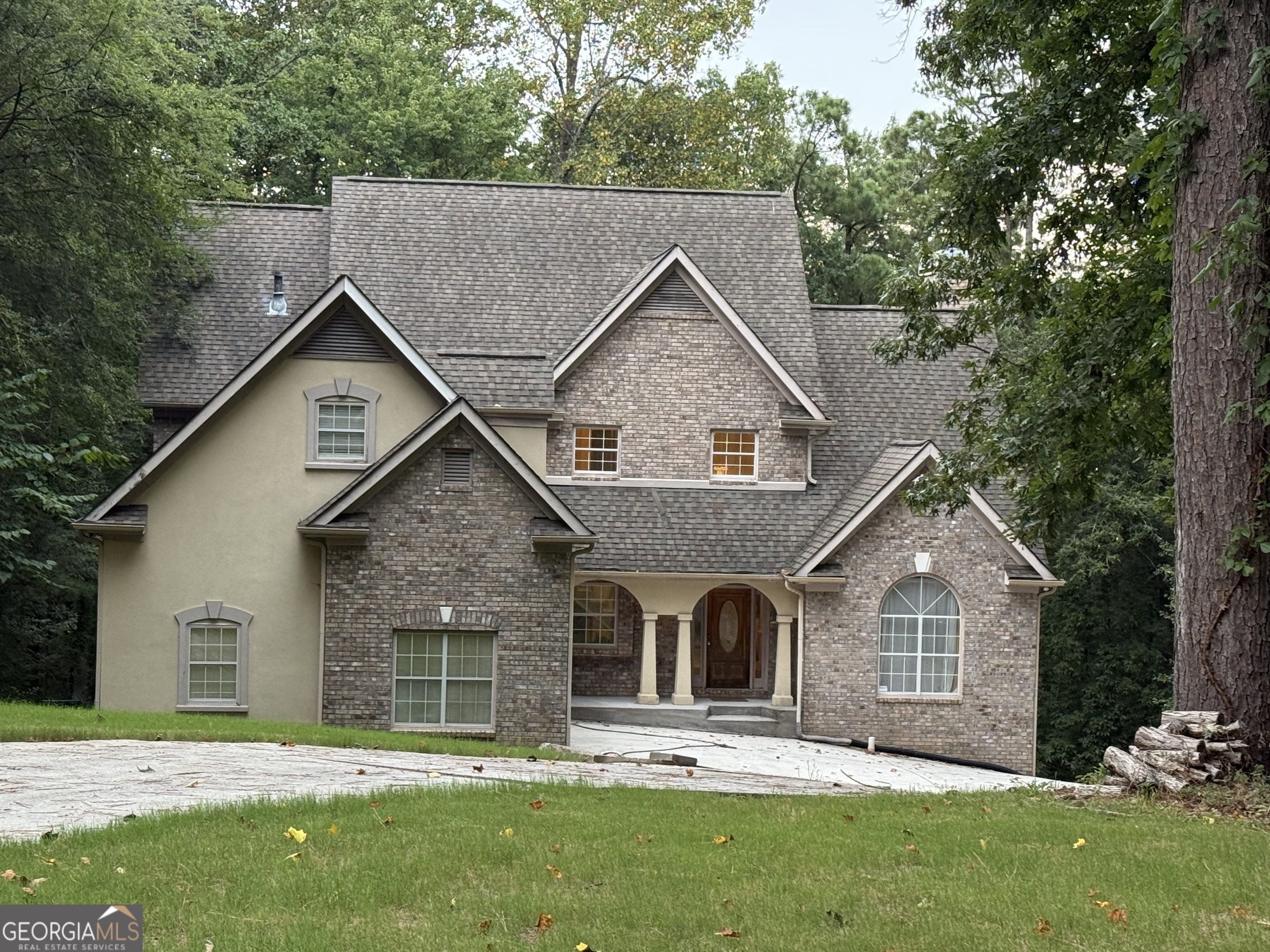 **Charming 3-Sided-Brick Two-Story Home on 2 Acres | Priced Below Market! | Sold As-Is** Enjoy the tranquility and privacy of this classic two-story home nestled on a spacious 2-acre cul-de-sac lot. Offering timeless appeal and sturdy construction, this property provides a fantastic opportunity for buyers seeking a peaceful retreat with plenty of room to expand or customize. **Highlights:** - Durable brick exterior for low maintenance and lasting beauty - Two-story design with generous living spaces - Full basement perfect for storage, a workshop, or future finishing projects - Situated on a private 2-acre lot in a quiet cul-de-sac, ideal for outdoor activities and potential landscaping - Conveniently located near popular restaurants, shopping, and amenities - Easy access to Interstate 20 for quick commuting and travel **Important Notes:** - This home is being sold **As-Is**, presenting an excellent opportunity for investors or buyers seeking a renovation project - Priced significantly below market value to reflect current condition and scope for improvements - Inspections are welcome but are for informational purposes only; no repairs will be made by the seller Don't miss your chance to own this home on a spacious lot in a convenient location at an unbeatable price. Whether you're looking for a renovation project or a private retreat with room to grow, this property has incredible potential. Schedule your showing today!