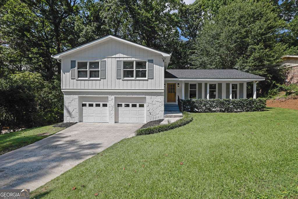 Beautifully Renovated Split-Level Home in Cross Gate Subdivision Located in the sought-after Wheeler High School district, this 3-bedroom, 3-bath home has been completely renovated and is move-in ready. The updated eat-in kitchen features built-in benches, quartz countertops, and stainless steel appliances, while the separate dining room, living room, and family room offer plenty of space for both everyday living and entertaining. The oversized primary suite includes a spacious closet and a luxurious ensuite with double vanity, quartz countertops, and a walk-in shower. Additional highlights include a new roof, upgraded HVAC system, fresh interior and exterior paint, stylish fixtures throughout, and beautifully landscaped grounds that enhance the home's curb appeal.