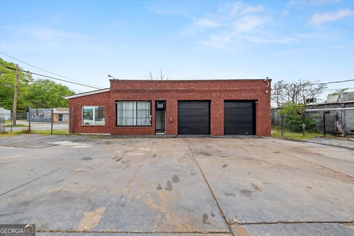 Spectacular opportunity to own an automotive location, reasonably priced. Featuring two bays with lifts. Located on nice fenced level lot. Property can easily be transformed into a different use. Call Today!