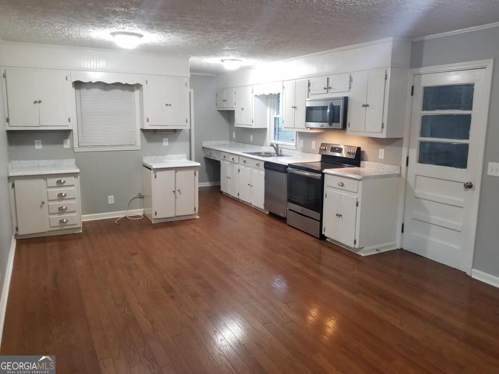 Photo of 5003 Calhoun Road NE, Adairsville, GA 30103 (MLS # 10658056)