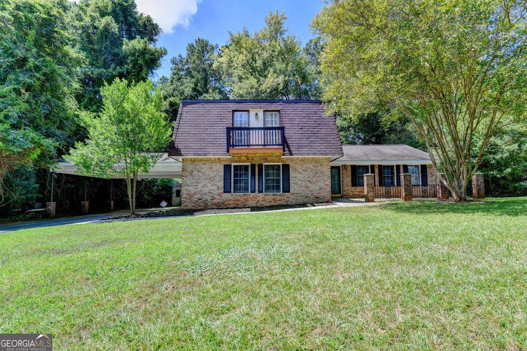 Photo of 567 Planters Row SW, Lilburn, GA 30047 (MLS # 10825226)