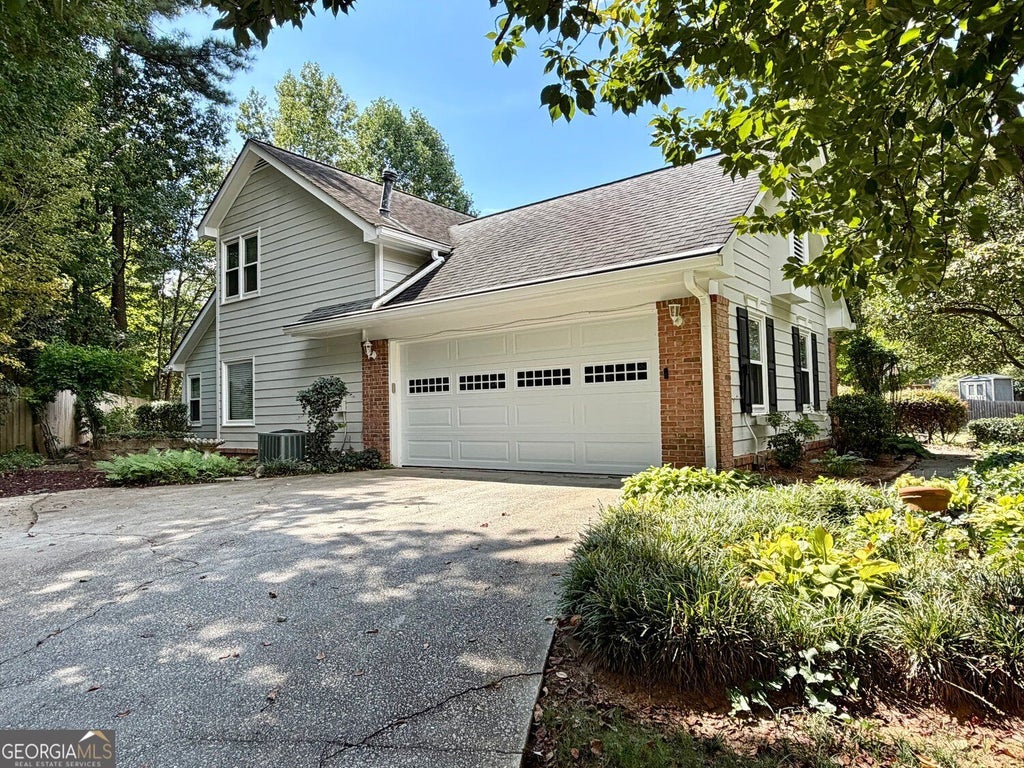 Photo of 3240 Country Walk Drive, Powder Springs, GA 30127 (MLS # 10849376)