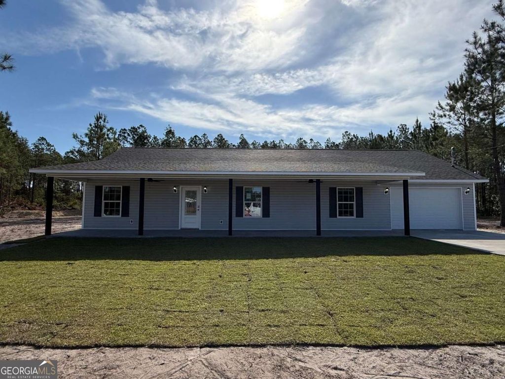 Photo of 121 Hawks Place, Waynesville, GA 31566 (MLS # 10737557)