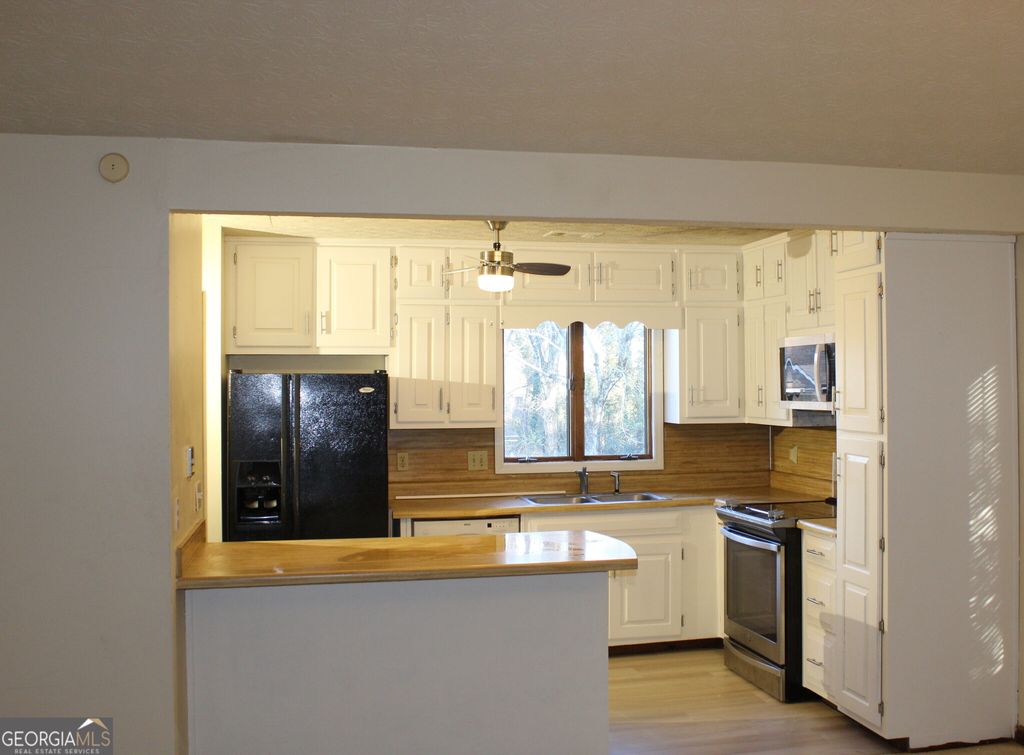 Photo of 1517 Stoneleigh Way, Stone Mountain, GA 30088 (MLS # 10711542)