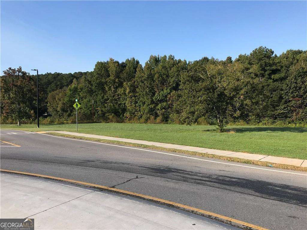 Approx. 3+/- commercial lot located on Burnt Hickory Road traffic circle. Great road frontage. Some use restrictions.