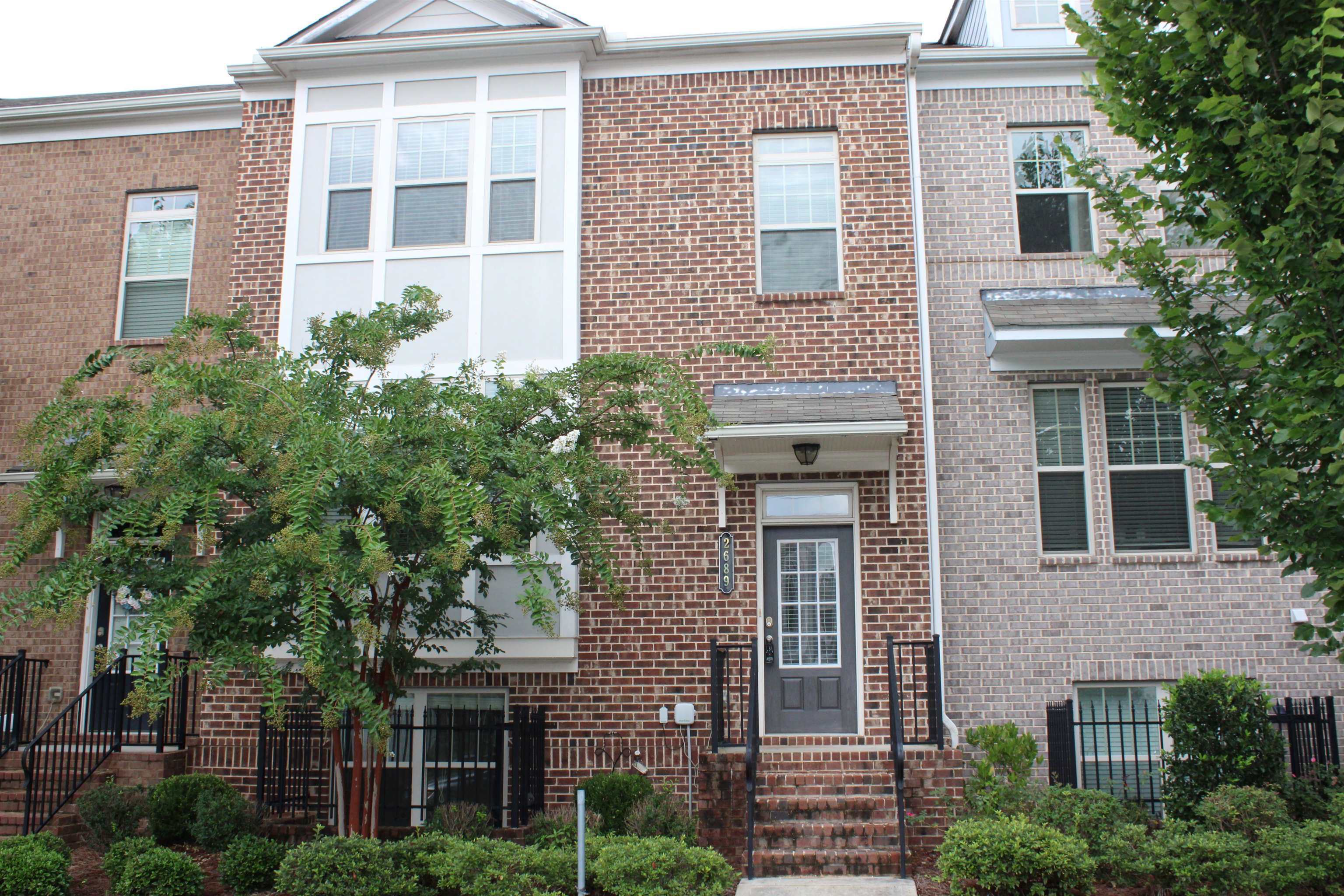 This 4-bedroom, 3.5-bathroom townhouse offers a luxurious living in a excellent Gwinnett location. Inside you can find a contemporary kitchen featuring a large granite island, perfect for entertaining guests, with plenty of cabinet space, stainless steel appliances. The open living area with beautiful hardwood floors creates a welcoming ambiance, perfect for both relaxation and socializing. Spacious master bed and bath with tiled shower. Secondary bedrooms have plenty of space. Great deck out back hangs over the 2 car garage! Must see.