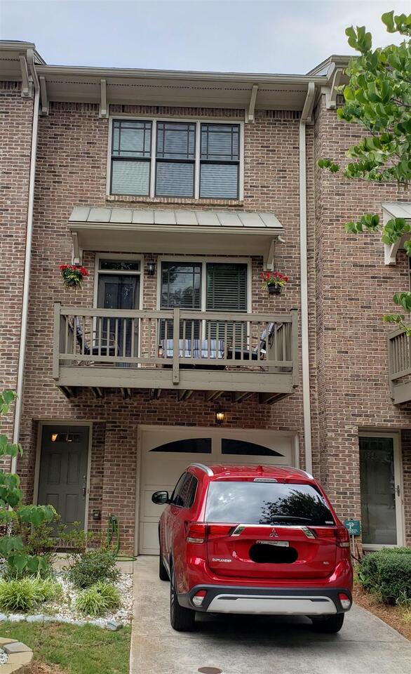 Well maintained 3 LEVEL Townhome. Terrace level has a 1 bedroom and ensuite full bath, perfect for in-laws or roommate. On the main level, you'll find a large living room filled w/natural light and french door open to balcony .nice sized kitchen with S/S appliances & granite counters opens to dining area.Upstairs has owners suite bedroom and 3rd bedroom with ensuite bathroom. Rear balcony and deck overlooking beautiful landscaping with crape myrtle and weeping willow trees.