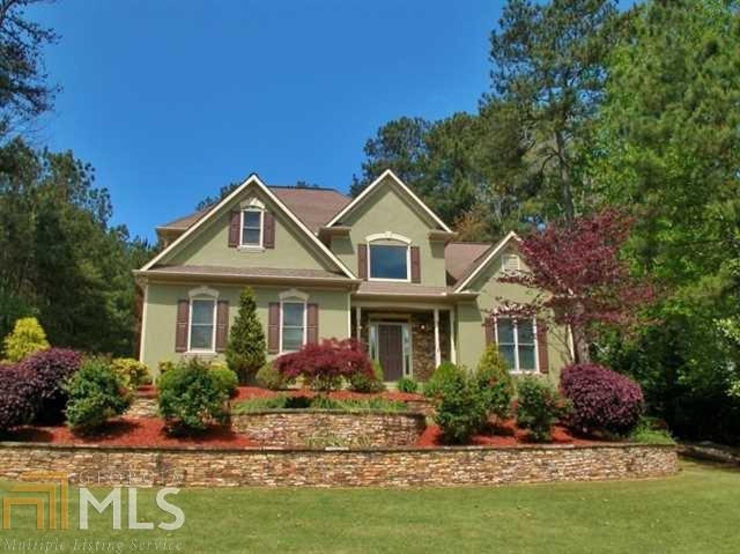 Move-in Ready, Desirable South Forsyth Home. Mstr on main w/remodeled en-suite BA. Fully remodeled bright & open kit w/granite & ss appliances. View opens to family room w/ vaulted ceilings & gas fplc. Two spacious secondary BR's & full bath + loft upstairs. Fully fin terrace level w/office, media room, full BA, & two open areas that could easily be redesigned to include BR & kit making complete in-law suite w/private patio & entrance. Entertain easily in the enclosed sunroom, wrap around deck & flagstone patios. Profess landscaped yard w/irrigation syst, 2 out bldgs.