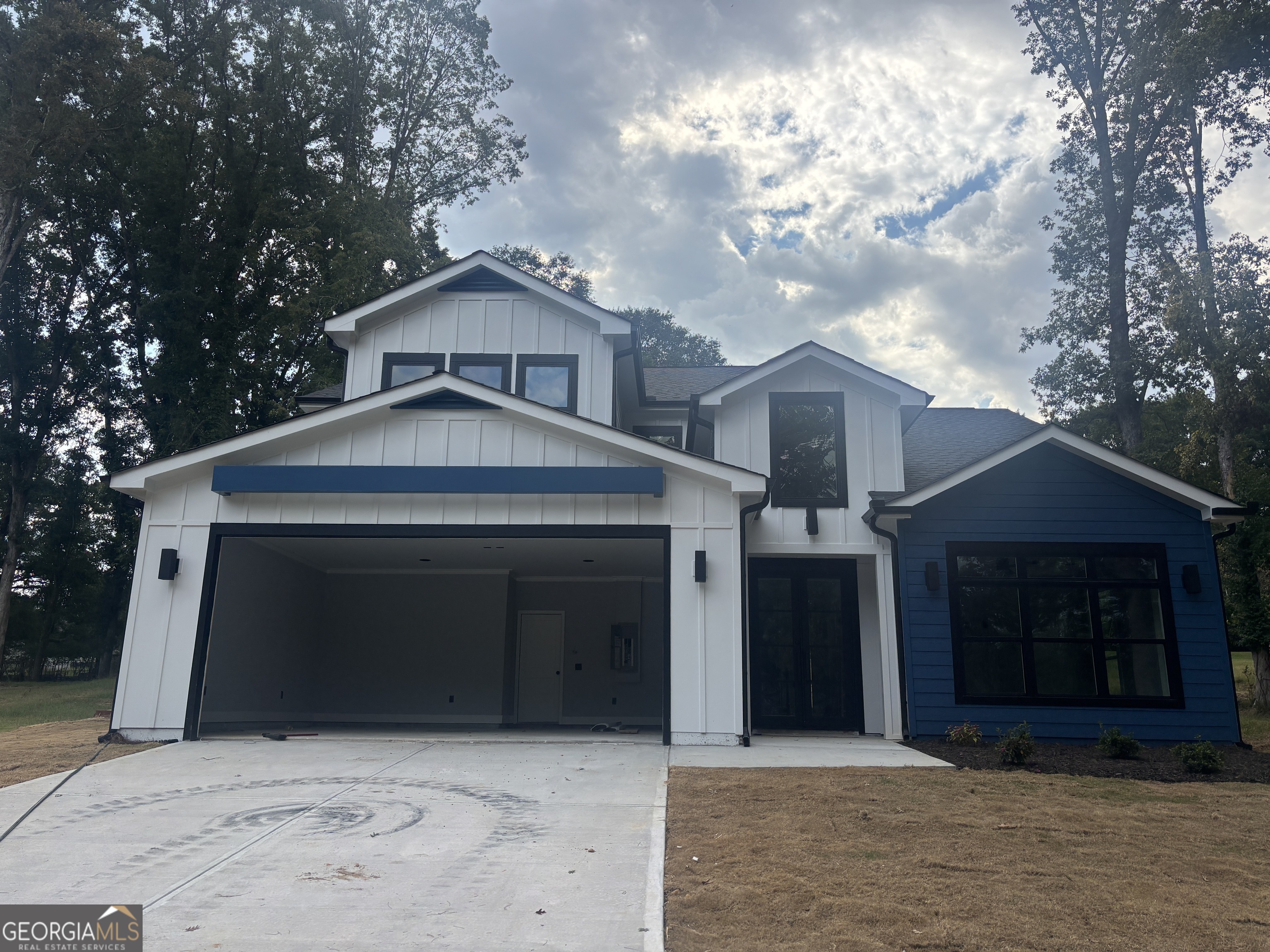 Stunning New Construction in Winder, GA - 4 Bed | 3.5 Bath | Prime City Location! Welcome to your dream home in the heart of Winder! This beautifully crafted 2-story new construction offers the perfect blend of luxury, functionality, and natural light throughout. Property Highlights: 4 Spacious Bedrooms | 3 Full Baths | 1 Half Bath Main-Level Owner's Suite featuring a luxurious tiled walk-in shower with cultured marble and a generous walk-in closet Expansive 2-story living room with soaring ceilings, an elegant fireplace, and tons of natural light Bright and airy sitting room surrounded by windows - the perfect spot to relax or read Gourmet kitchen with a large island with Quartz Calacatta, ample counter space, and a walk-in pantry - ideal for entertaining and everyday living Jack & Jill bedrooms upstairs with cozy carpeted floors Spacious upstairs den, perfect for a game room, media center, or second living area Connected to city sewer and serviced by natural gas for energy efficiency and convenience Nestled within city limits, this home offers convenient access to local shopping, schools, and parks - all while providing the comfort and space of suburban living. Don't miss your chance to own this gorgeous, light-filled home built with quality and care. Schedule your tour today and experience all this home has to offer! Builder is offering $5000 Towards Closing Cost, Rate Buy Down, or Down Payment!!!!
