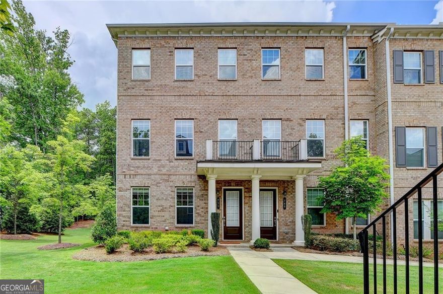 ABSOLUTELY GORGEOUS END UNIT Townhome located in the Sought-After Caravelle at Windward Park, one of the newest communities in Alpharetta, Excellent Location within Fulton County with Top-Rated Schools.    This 3BR/3.5BA Home with a 2-Car Garage has all the BELLS & WHISTLES of LUXURY LIVING!  9 ft Ceilings on the Main and 9 ft on the Second and Third Floors. Upgraded HARDWOODS on the TERRACE and MAIN level, Chef Kitchen w/GRANITE, SS Appliances, CUSTOM Backsplash & UPGRADED Cabinets.  Generously sized family room with a fireplace and door leading out to a substantial deck for grilling and entertaining Overlooking Beautiful Wooded Area. Also on the Main Level is a Half-Bath.  Upper level has 2 OVERSIZED MASTER Suites w/HUGE Wardrobe CLOSETS, DOUBLE SIZED Spa-like SHOWERS.  Lower Level has a BEDROOM w/PRIVATE FULL BATH.  AWARD-WINNING Schools, TONS of Shopping, AVALON, Top RESTAURANTS, Sought-out COMMUNITY, Nature/Walking Trails on GREENWAY nearby.  Adjacent to the MARTA Park & Ride at Windward Park.