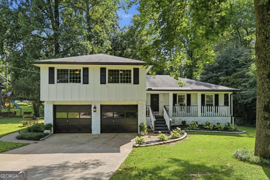 Photo of 451 Little John Drive NW, Lilburn, GA 30047 (MLS # 10869013)