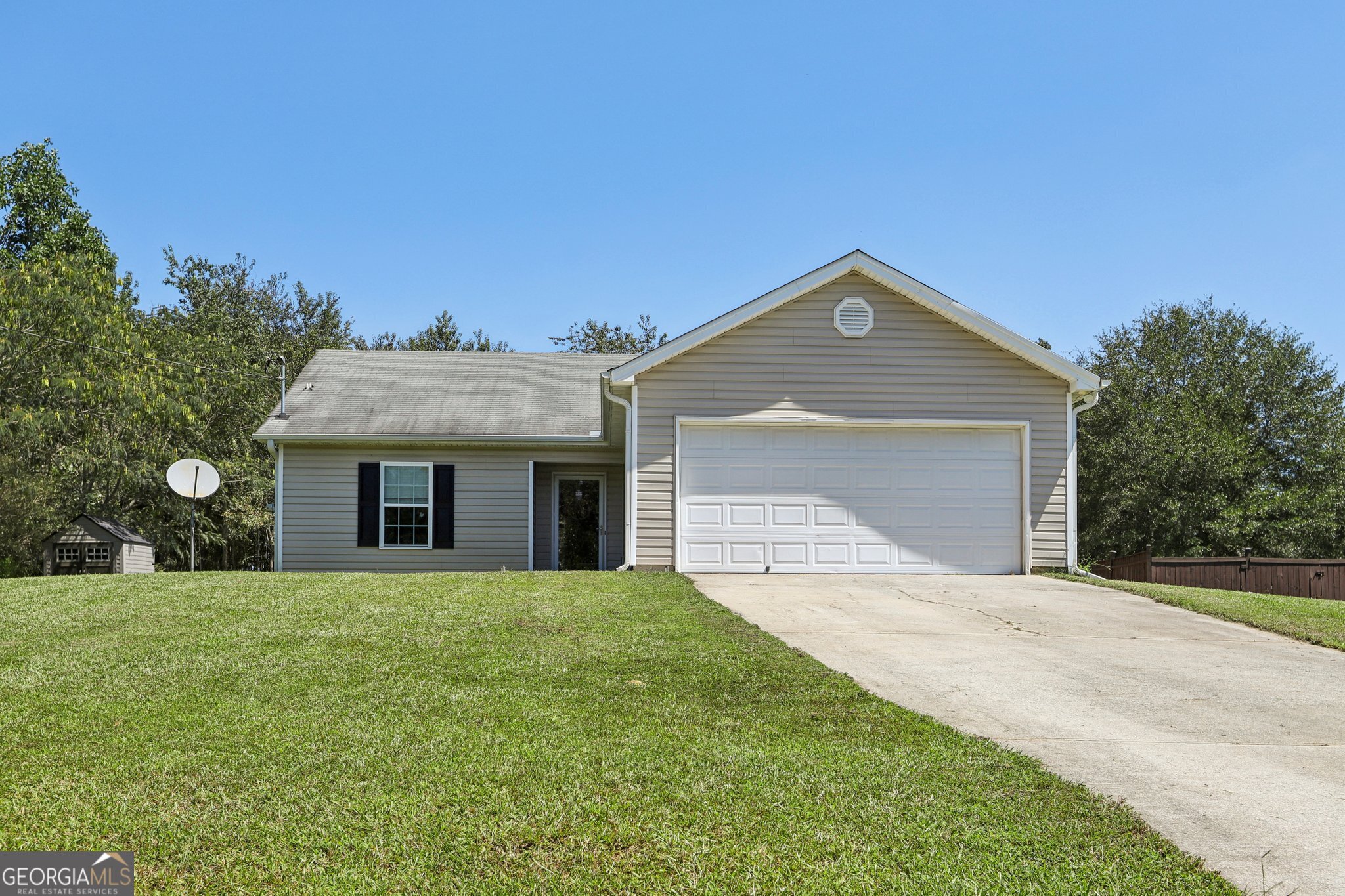 Welcome to this charming 3-bedroom, 2-bath ranch home, perfectly situated on a level lot of over half an acre. The inviting layout features a bright kitchen and dining combo that flows easily for everyday living. A convenient laundry closet is tucked in the hall, and all appliances are included to make move-in a breeze. The primary suite offers a walk-in closet and private bath, while two additional bedrooms provide plenty of space for family, guests, or a home office. Outside, enjoy the large fenced backyard-ideal for kids, pets, or simply relaxing in your own private space. Recent updates include a new HVAC system installed in 2021, giving you peace of mind for years to come. With a spacious lot, easy accessibility, and a comfortable single-level design, this home is ready for its next owners to move right in and make it their own.