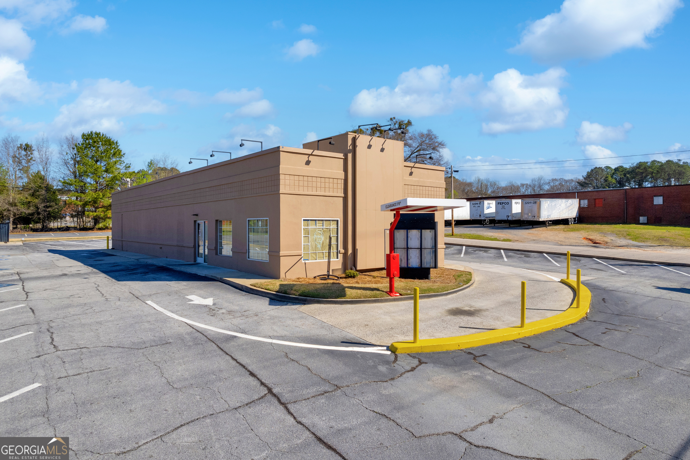 Prime Drive-Thru Restaurant Opportunity in Monroe, GA - 2900 Sq Ft Standalone Building This 2,900 sq ft standalone restaurant with a drive-thru is located in the highly sought-after Monroe, Georgia, along one of the town's main thoroughfares. The property boasts excellent visibility, with approximately 15,000 vehicles passing by daily. Access is convenient, featuring two entry points-one off Spring Street and another off Henson Drive. The property includes a spacious parking lot, accommodating up to 30 vehicles, and is just minutes from downtown Monroe, Piedmont Hospital, and the new Monroe Pavilion. Don't miss out on this exceptional opportunity in a growing area. Contact Nathan for more details and to schedule a viewing.