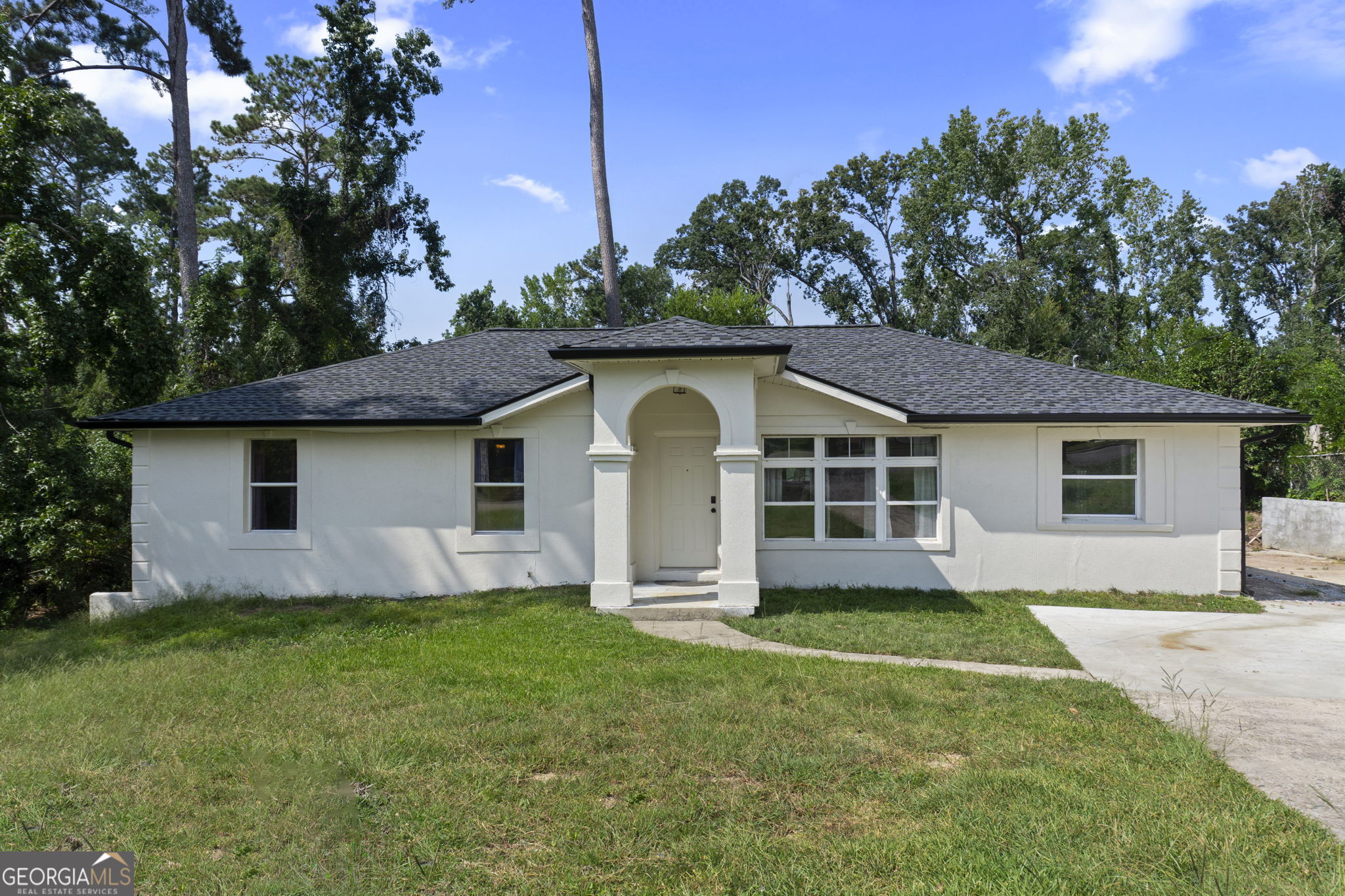 This beautifully updated ranch checks all the boxes and then some! With a NEW roof, fresh exterior paint, half the interior freshly painted, brand new floors, new windows, new gutters, and 14 inch deep R&R blown insulation. Step inside to discover a bright, open layout designed for both comfort and flexibility. The inviting living room flows effortlessly into the kitchen and dining area, creating the perfect space for gatherings. The updated kitchen is a dream with modern finishes like quartz countertops, new cabinets, ample counter space, and stylish details that make cooking and entertaining a joy. Need a little extra room? You'll love the second living space-ideal for a home office, study area, playroom, workout space, or cozy den. The options are endless, and this home adapts to your lifestyle. Outside, the large backyard offers plenty of room for play, gardening, or simply relaxing under the Georgia sky. Whether you're hosting barbecues, setting up a fire pit, or letting pets and kids roam free, this space will quickly become a favorite. Location matters, and this one can't be beat. Just minutes from the Augusta Exchange, Augusta Mall, I-520, I-20, and Fort Eisenhower, you'll have shopping, dining, and an easy commute right at your fingertips. All of this comes at an incredible price, making it a fantastic opportunity for anyone looking to enjoy a move-in ready home with big-ticket updates already taken care of.