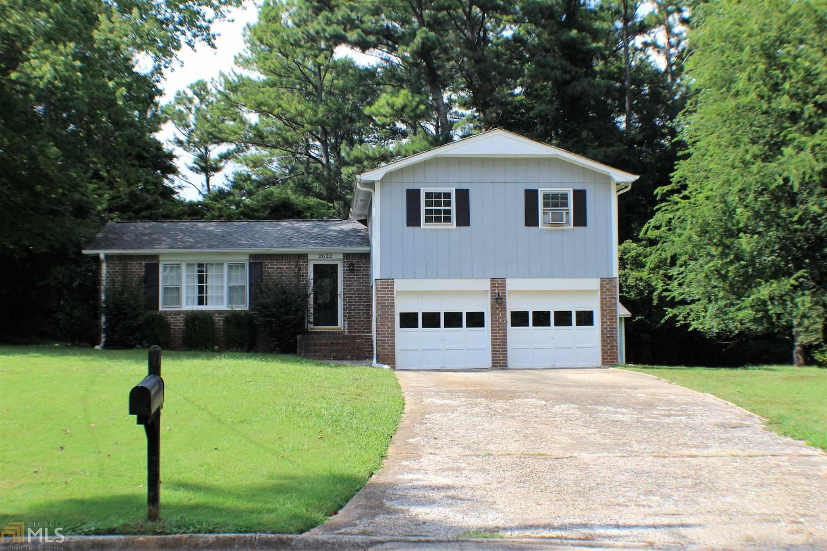 Location Location Location - This Well Maintained Split Level Is Just Minutes From Downtown Duluth & Gwinnett Place Mall With Easy Commute To Atlanta - Four Sides Brick Culdesac Lot With Yard Perfect For Entertaining - Lower Level Bonus Can Be Used For Multiple Purposes - Main Level Has A Large Living Room A Bright Eat In Kitchen With Colorful Backsplash - Owners Suite Is On The Upper Level With 2 Additional Good Sized Secondary Bedrooms - Updates Include Backsplash, Stainless Appliances, Butcher Block Counters, Most Light Fixtures/ Fans, Toilets Vanities, Roof, Gutter Covers, Interior Paint, Sodded Back Yard, Carpet, & Water Heater