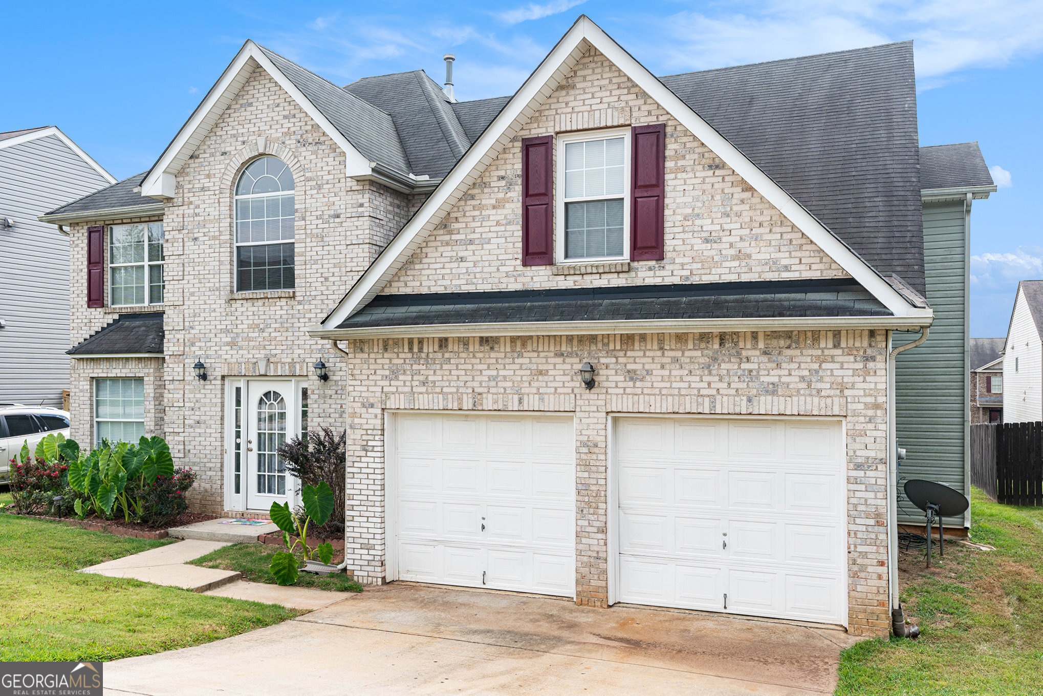 Welcome to this beautifully maintained home in a sought after Hampton community! Offering plenty of space and comfort this property features an inviting open floor plan that's perfect for everyday living and entertaining. This home features new flooring throughout and fresh paint! There are 4BR, 2 full baths, and 2 half baths. There is a formal living and dining room, as well as a family room with a fireplace. Upstairs you will find a huge primary suite. There are vaulted ceilings and a sitting area. This suite has a private staircase to the family room. The garage has been converted to living space, so you can keep it for your home office, gym, or convert it back to a traditional garage. Come and see all this home has to offer!