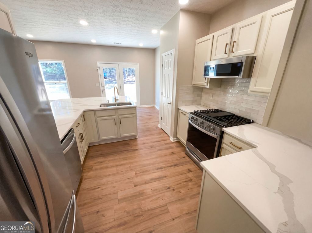 Photo of 2120 Village Green Drive, Fairburn, GA 30213 (MLS # 10689126)