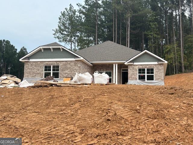 BEAUTIFUL NEW BRICK RANCH WITH 3 CAR SIDE ENTRY GARAGE ON 1 ACRE. Awesome Top Selling 4BR/2BA Ranch Home on a Beautiful Wooded Homesite. . Home Features Spacious kitchen with gorgeous granite island, upgraded painted white cabinets & stainless steel appliances. LVP IN MOST ROOMS. Expansive family room. Large Master Suite with tray ceiling, walk-in closet, dual quartz vanity, shower & soaking tub. Two more sizable secondary bedrooms. Includes 4 zone irrigation system. ** Only $1,000 Earnest Money** Located in highly sought after, beautiful Jackson County, GA and convenient to the Pendergrass/Jefferson Exit or Maysville/Commerce Exit on I-85 for quick travel to Atlanta, GA, Lake Hartwell & Greenville, SC, as well as Hwy 129 for easy access to Athens, GA!!! Multi-Award Winning, Family Owned Builder. 1 Yr Builder's Warranty, 2 Yr Systems Warranty, 10 Yr Structural Warranty, 2 Pre-Closing Walk Throughs & a Smart Home Package. Call for builder incentives. Contingency acceptable if other property is listed or under contract. "Don't miss your chance on a beautiful new home in Eagle Heights with a budget Friendly HOA. Eagle Heights is convenient to dining, shopping and easy access to Greenville, SC, Atlanta, Ga, and I-85.`` Check out our beautiful, decorated model home in Eagle Heights for current design trends. Model Home Sun and Mon 1 pm-6 pm, Tue-Sat 11 am-6 pm. "Renderings and plans are for illustration purposes only and may include additions, options or modifications not part of the standard offering, and are subject to change without notice or obligation".